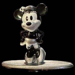 Vintage-style cartoon mouse on a stand