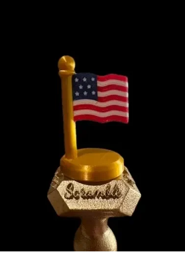 Miniature American flag on golden base