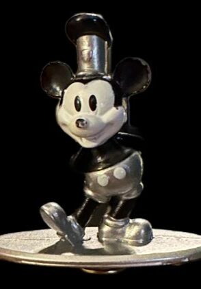 Classic mouse character in silver attire