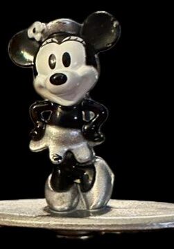 Vintage-style cartoon mouse on a stand